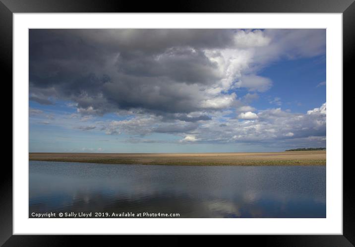 Heavy Skies over Calm Waters Framed Mounted Print by Sally Lloyd