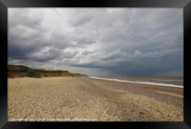 Stormy sky at Covehithe in Suffolk Framed Print by Sally Lloyd