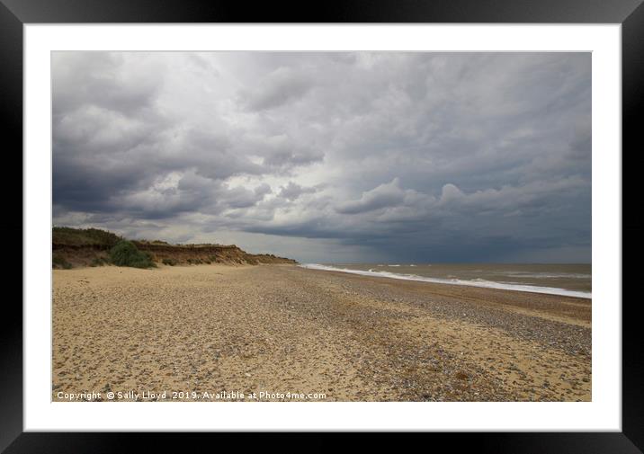 Stormy sky at Covehithe in Suffolk Framed Mounted Print by Sally Lloyd