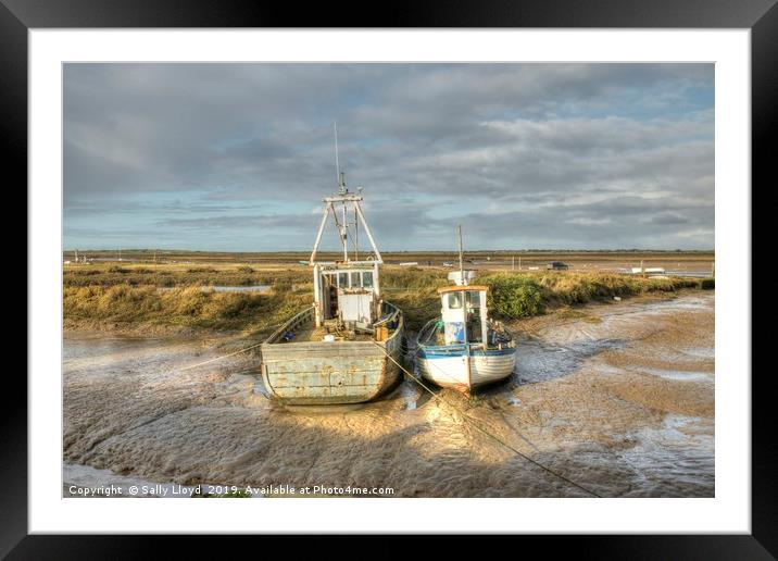 Low tide boats at Brancaster Framed Mounted Print by Sally Lloyd