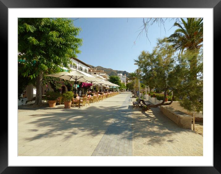 Relaxation on Port de Pollenca Street Framed Mounted Print by paul cobb