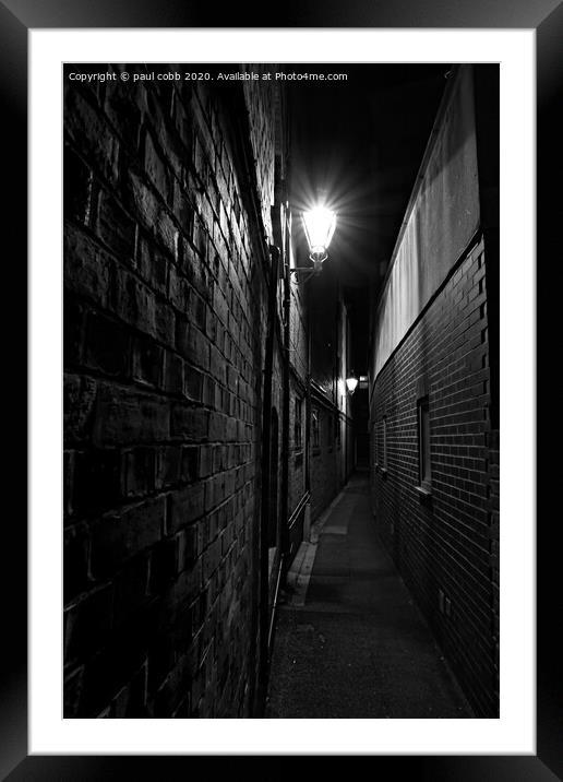 Into the alley.  Framed Mounted Print by paul cobb