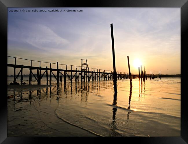 Poles apart. Framed Print by paul cobb