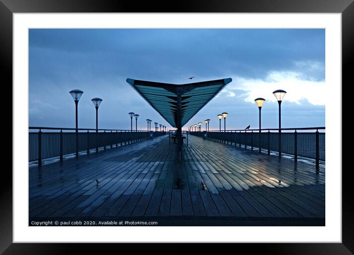 Blue pier. Framed Mounted Print by paul cobb