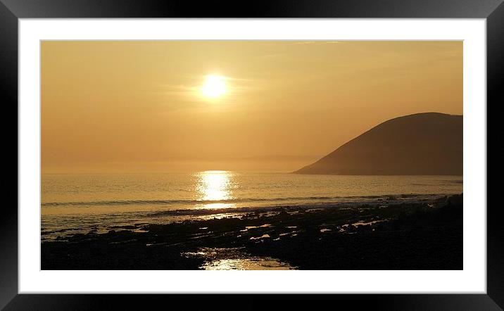 Sunset over Manorbier Bay Framed Mounted Print by Mandy Llewellyn