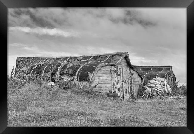 Fishermen's Huts in monochrome.  Framed Print by Mark Godden