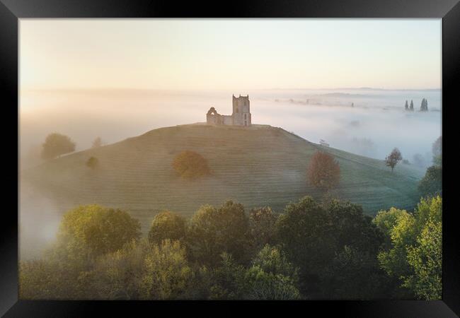 Rising Above The Fog Framed Print by Rich Wiltshire