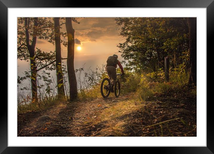 Mountain biking till the sunset Framed Mounted Print by Fabrizio Malisan