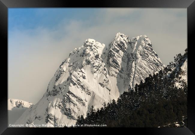Snow on the mountain peaks Framed Print by Fabrizio Malisan