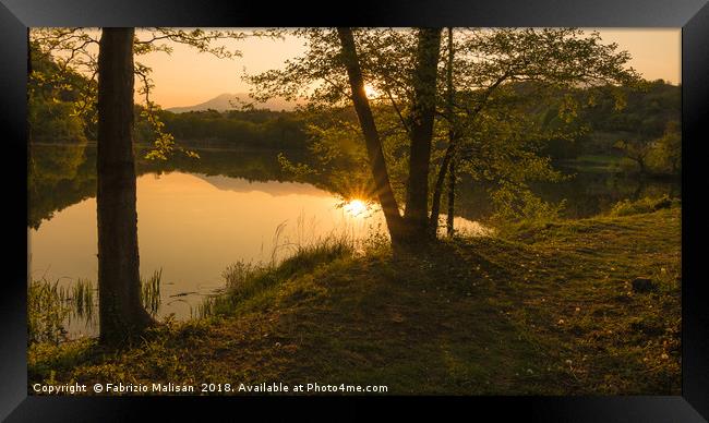 Sunset over the lake Framed Print by Fabrizio Malisan