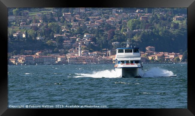 Ferry boat in Bellagio Lake Como Framed Print by Fabrizio Malisan