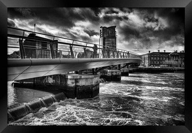 Bridge Over Stormy Waters Framed Print by Alan Campbell