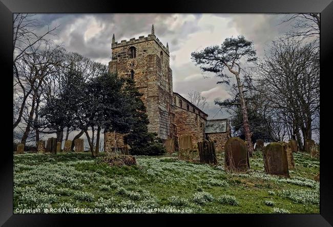 "Snow drops and storm clouds at St.Laurences Churc Framed Print by ROS RIDLEY