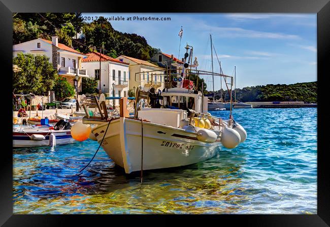 Boat in Greek islands Framed Print by Ian Danbury