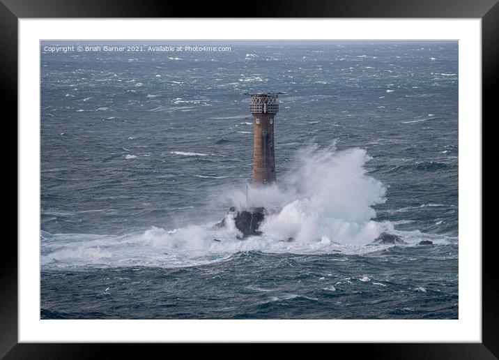 Longships Lighthouse in a Storm  Framed Mounted Print by Brian Garner