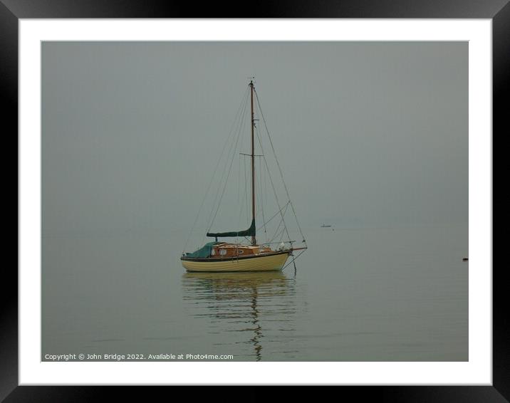 A Yacht in the Thames Estuary Framed Mounted Print by John Bridge