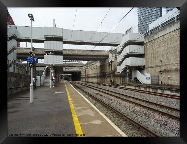 Stratford International platform Framed Print by John Bridge