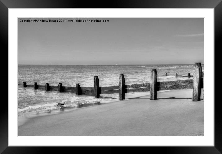 Barmouth Traditional sea wave breaker on beach. Framed Mounted Print by Andrew Heaps