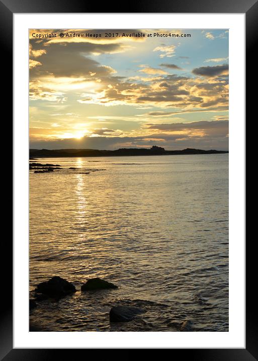 Evening coastal sunset looking towards  Bamborough Framed Mounted Print by Andrew Heaps
