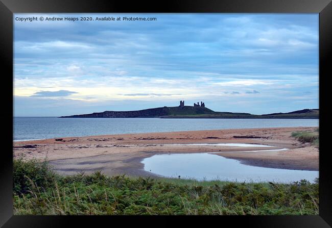 Dunstanburgh Castle from Embleton beach in the eve Framed Print by Andrew Heaps