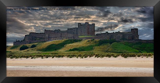 Bamburgh castle from the beach Framed Print by Andrew Heaps