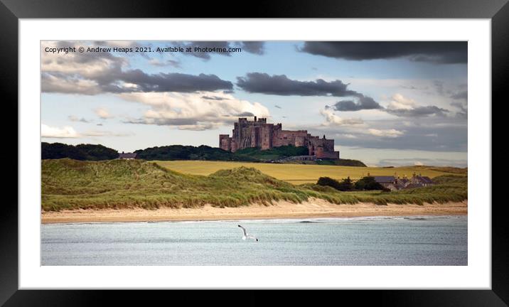 Majestic Bamburgh Castle Standing Tall Framed Mounted Print by Andrew Heaps