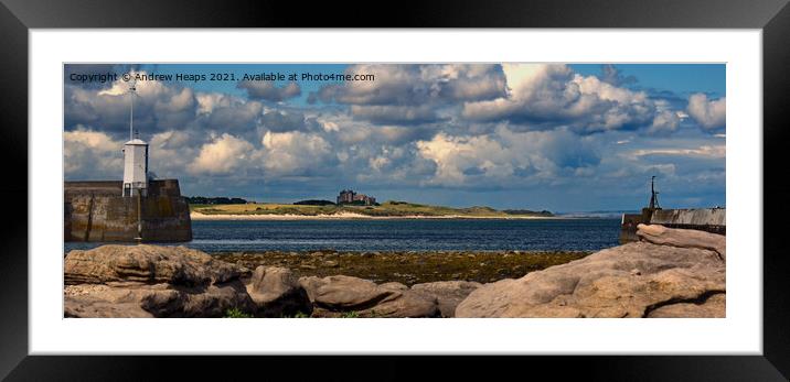 Bamburgh Castle viewed from Seahouses Framed Mounted Print by Andrew Heaps