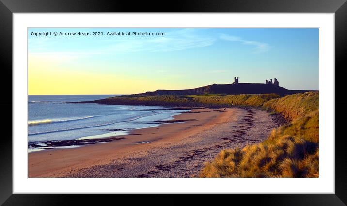 Sunset scene looking towards Dunstanburgh Castle. Framed Mounted Print by Andrew Heaps