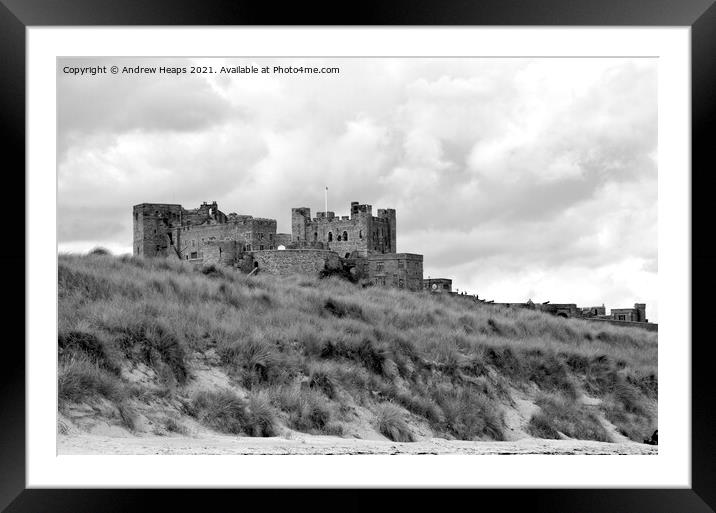 Bamburgh castle in Northumberland Framed Mounted Print by Andrew Heaps