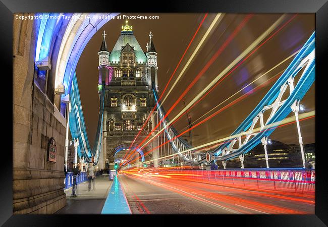 Tower Bridge Rush hour Framed Print by Simon Taylor
