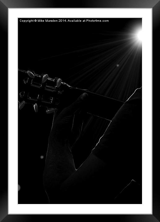 Man playing guitar in concert   Framed Mounted Print by Mike Marsden