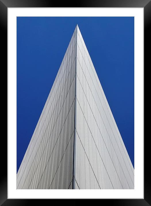 An angular building pierces a blue sky  Framed Mounted Print by Jamie Lumley