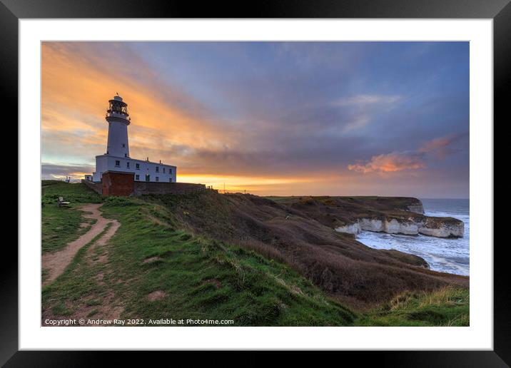 Setting sun behind Flamborough Lighthouse Framed Mounted Print by Andrew Ray