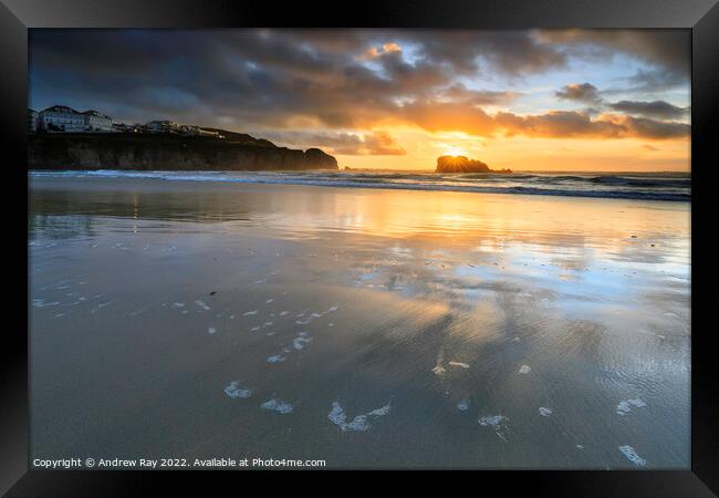 Setting sun behind Chapel Rock (Perranporth)  Framed Print by Andrew Ray