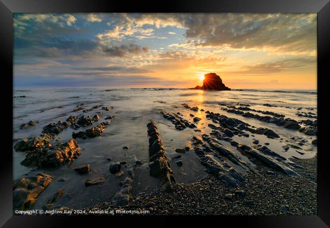 Setting sun at Widemouth Bay Framed Print by Andrew Ray