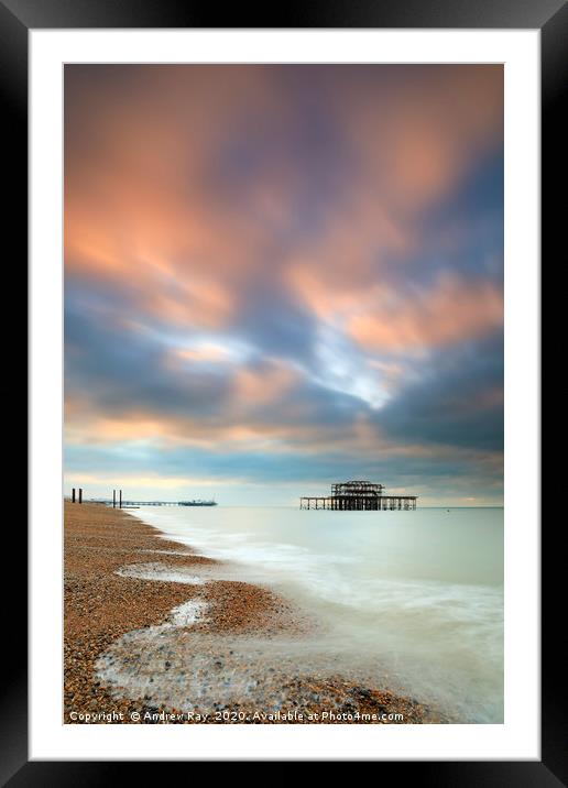 Brighton Piers at sunrise Framed Mounted Print by Andrew Ray