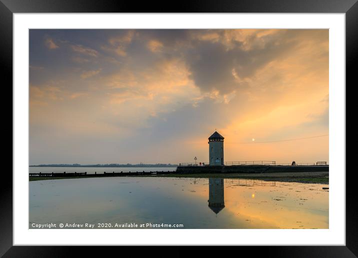 The setting sun behind Batemans Tower (Brightlings Framed Mounted Print by Andrew Ray