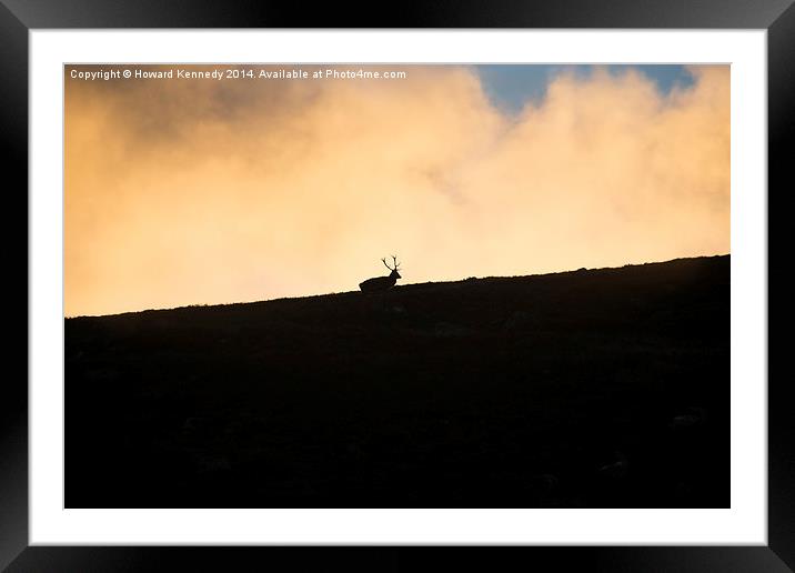 Red Deer against fiery sky Framed Mounted Print by Howard Kennedy
