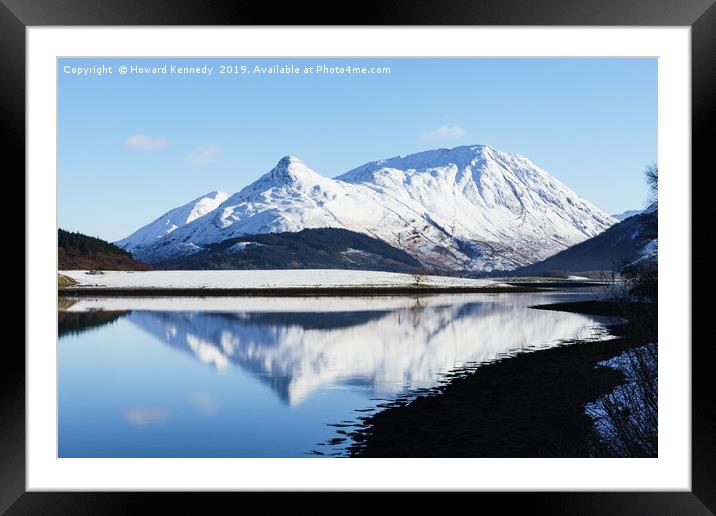Pap of Glencoe reflected on Loch Leven in Winter Framed Mounted Print by Howard Kennedy