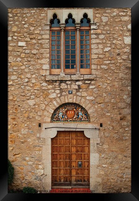 Mediterranean Romanesque building doorway Framed Print by Miguel Herrera