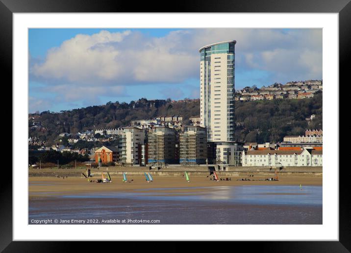 Land yachting Racing in front of the Meridian Tower Swansea Bay Framed Mounted Print by Jane Emery