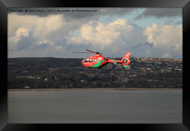 Wales Air Ambulance over Swansea Bay Framed Print by Jane Emery