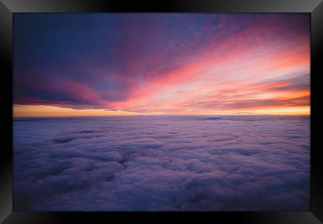 Above the clouds  Framed Print by Louise Wilden