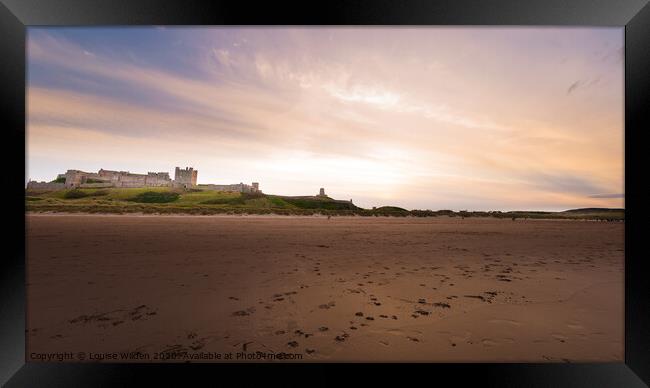 Bamburgh Castle at sunset Framed Print by Louise Wilden