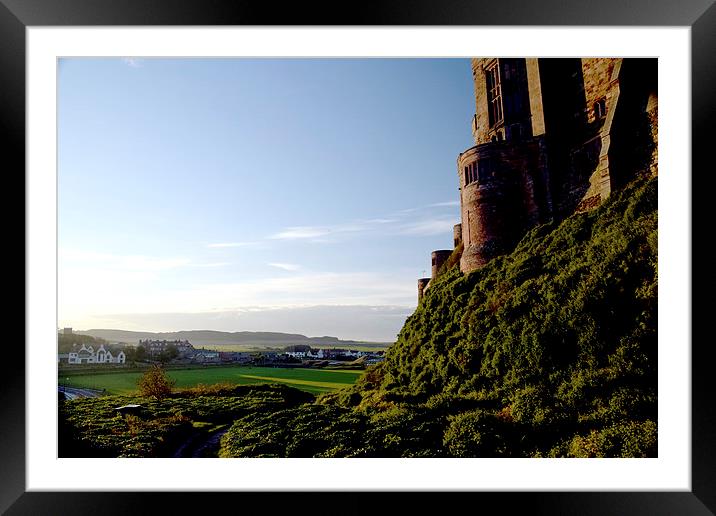  Stunning view from behind Bamburgh Castle Framed Mounted Print by Michael Maher