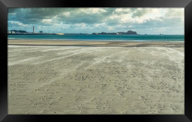 Blowing sand on St Helier beach Framed Print by Jonathon barnett