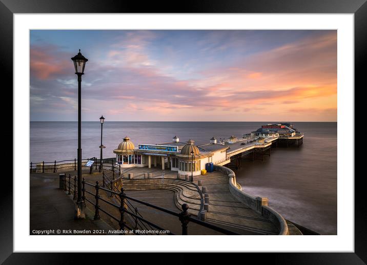 Cromer Pier Framed Mounted Print by Rick Bowden