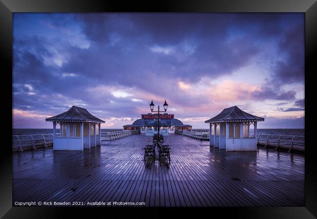Pier after the Rain Framed Print by Rick Bowden