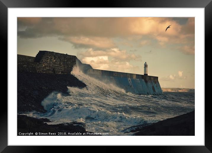 Evening lighthouse light Framed Mounted Print by Simon Rees