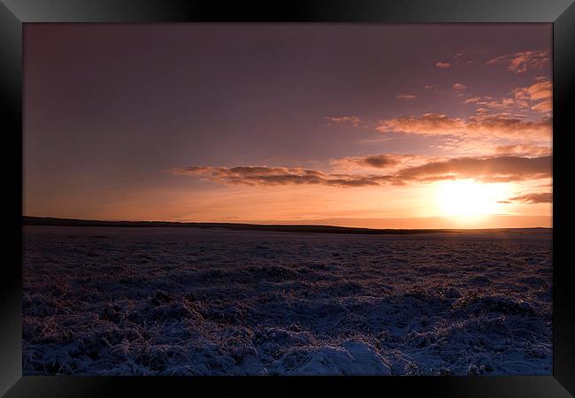  Sunset over the snows Framed Print by Chris Griffin